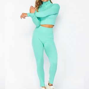 Activewear set in Tiffany blue. Cropped top and leggings. Shown size M